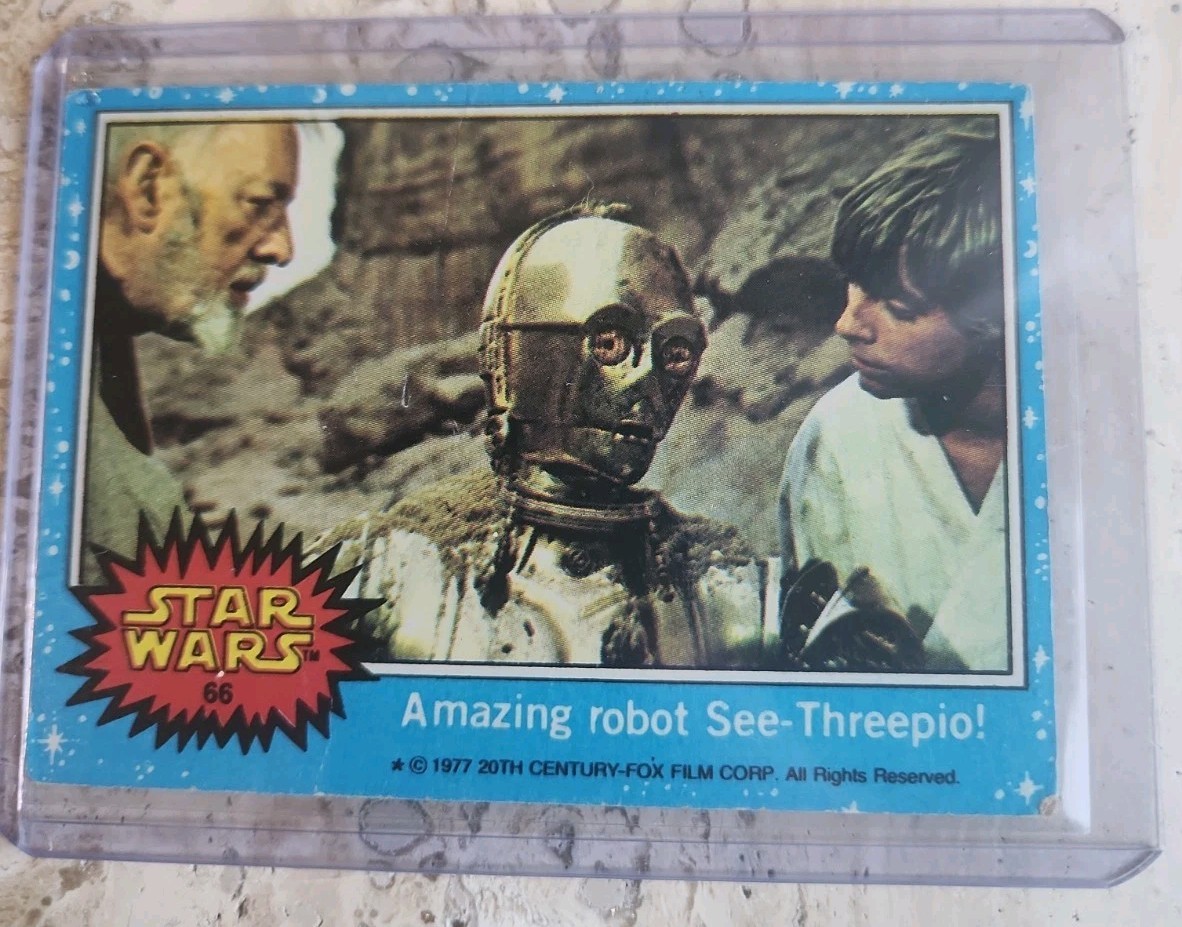 1977 Topps Star Wars #66 Amazing robot See-Threepio Series 1 Blue Ungraded Card 1977 Topps Star Wars #66 Amazing robot See-Threepio Series 1 Blue Ungraded Card