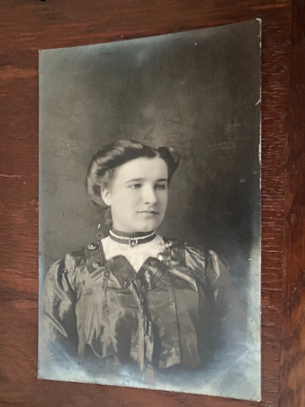 Young Lady in Dark Dress and Choker Necklace and Blouse RPPC Postcard