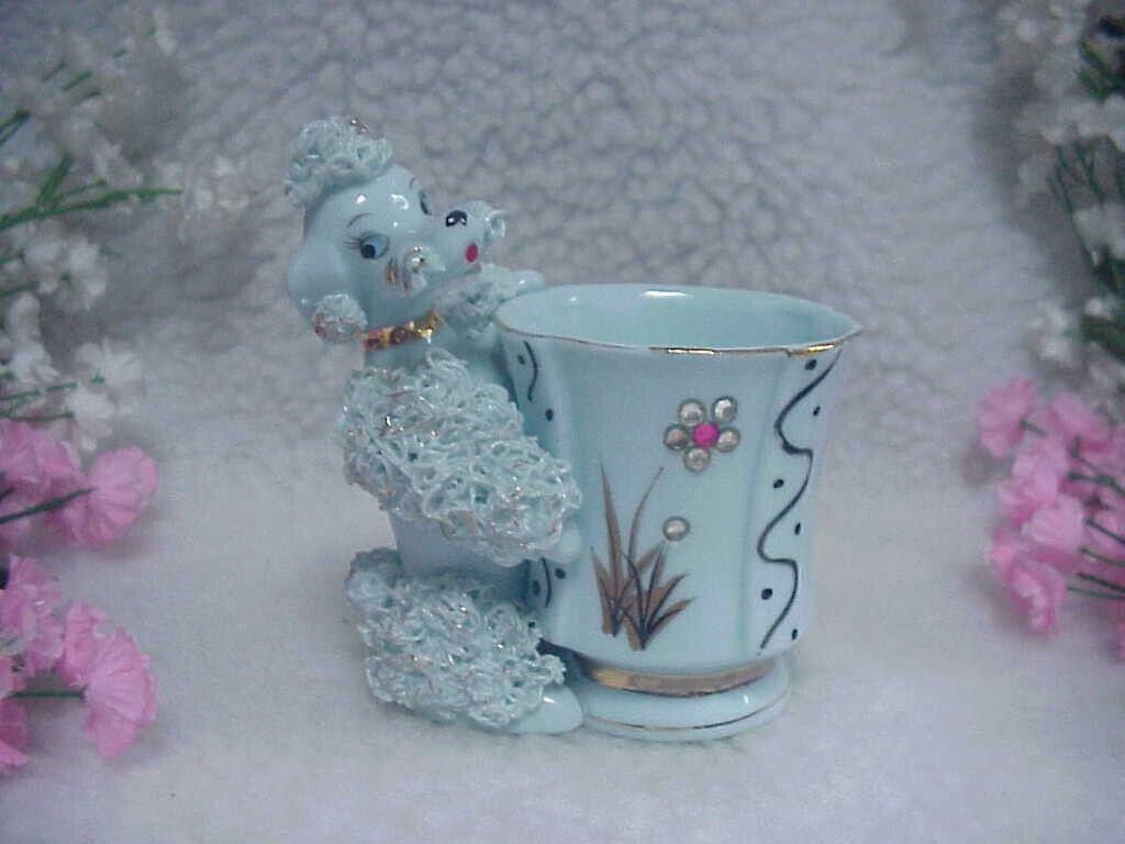 Blue Spaghetti Poodle Standing Next To Vase With Pattern & Rhinestones -Pretty