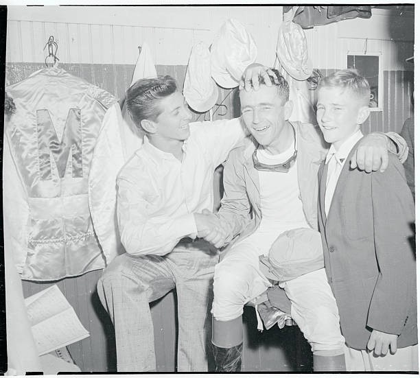 Jockey Dave Erb center of attention after rode Needles to victory- 1956 Photo