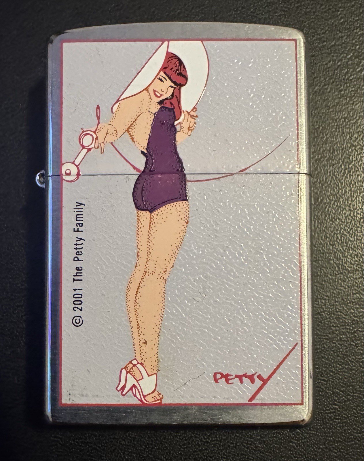 Vintage Retired Zippo Lighter 2000 The Petty Family Purple Dress Women Vintage Retired Zippo Lighter 2000 The Petty Family Purple Dress Women