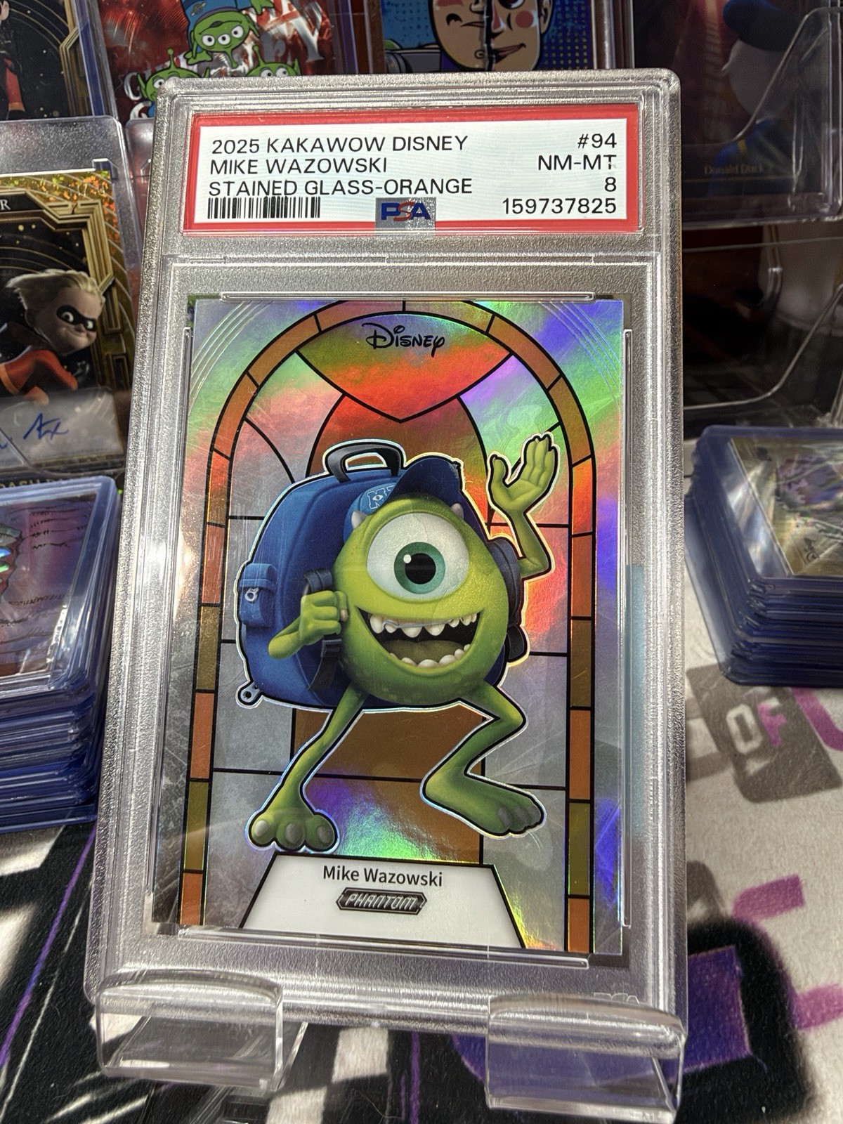 Disney 2025 Kakawow Disney Mike Wazowski 30/50 Stained Glass-Orange  #94 PSA 8