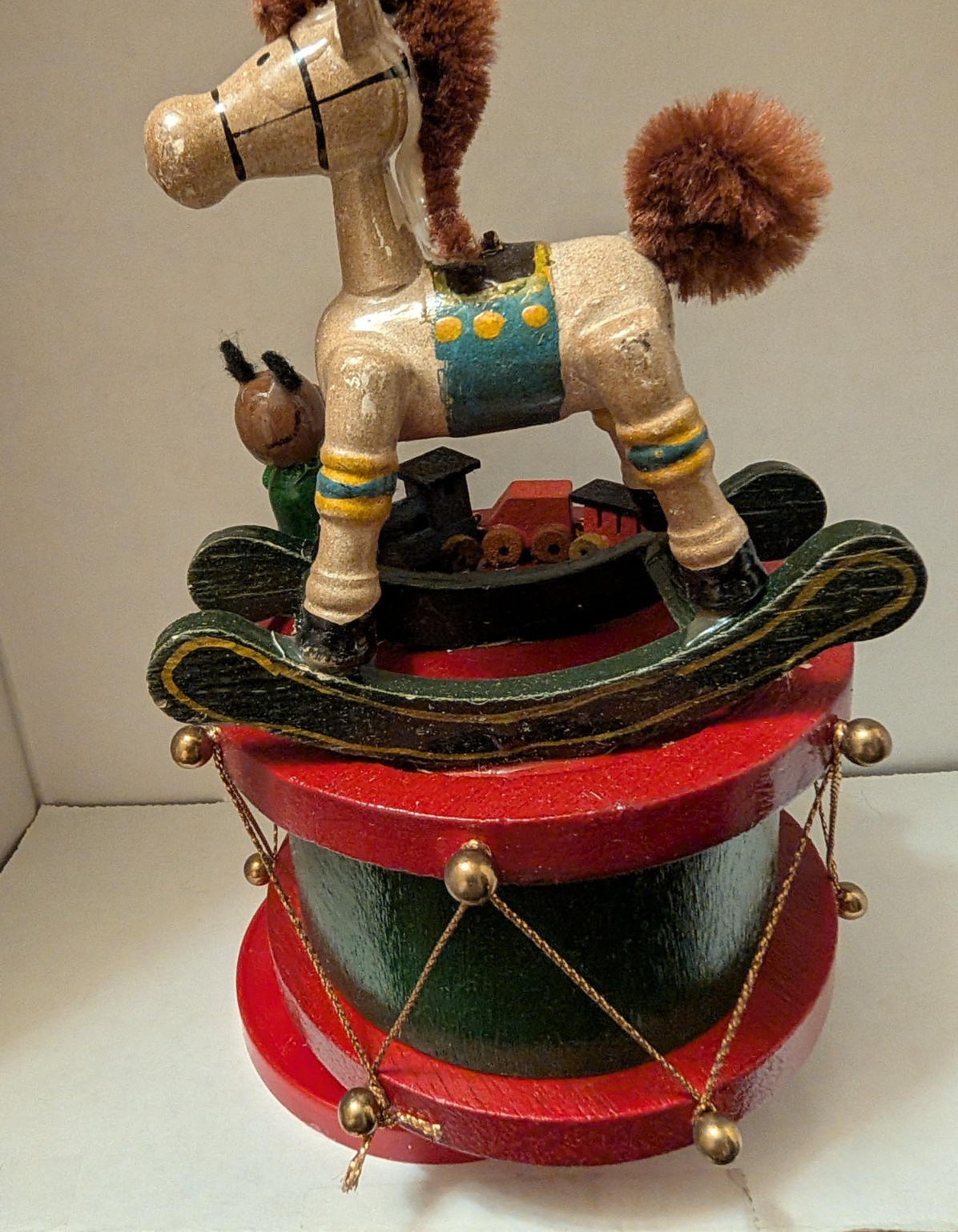 Vtg Wooden Music box featuring Rocking Hourse,Teddy Bear, Train  on drum base.