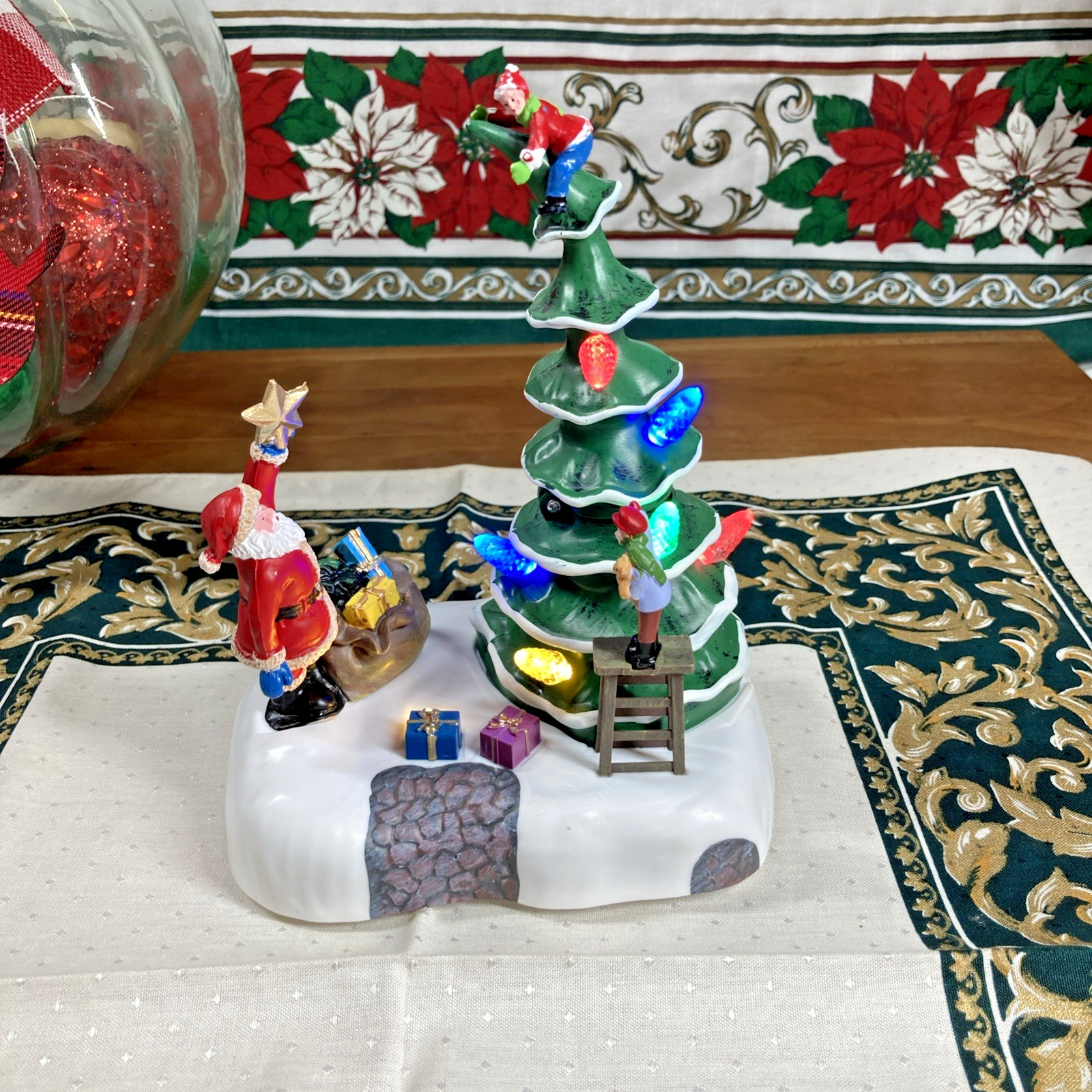 Holiday Time Light-up Musical Christmas Village Decorating The Tree 8.3\ Holiday Time Light-up Musical Christmas Village Decorating The Tree 8.3\