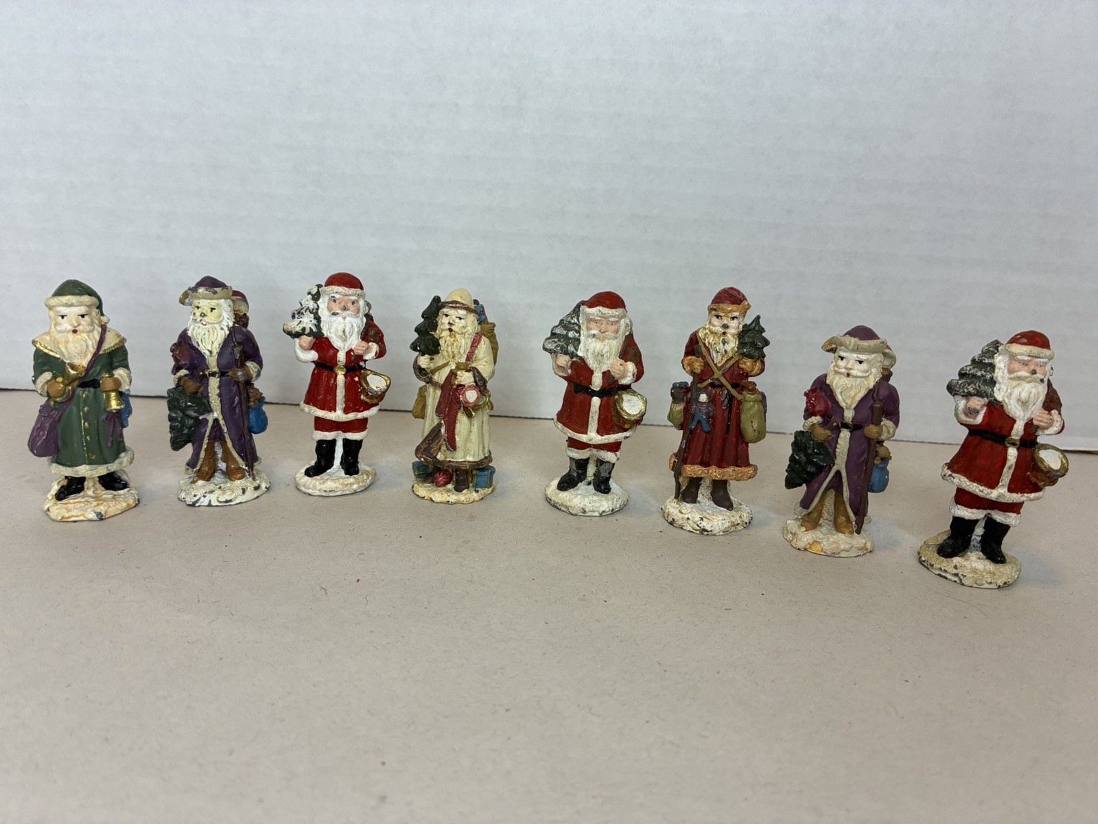 Lot 8 VTG Heavy Cast Metal Santa Claus Figurines Christmas Dimestore Lead Slush