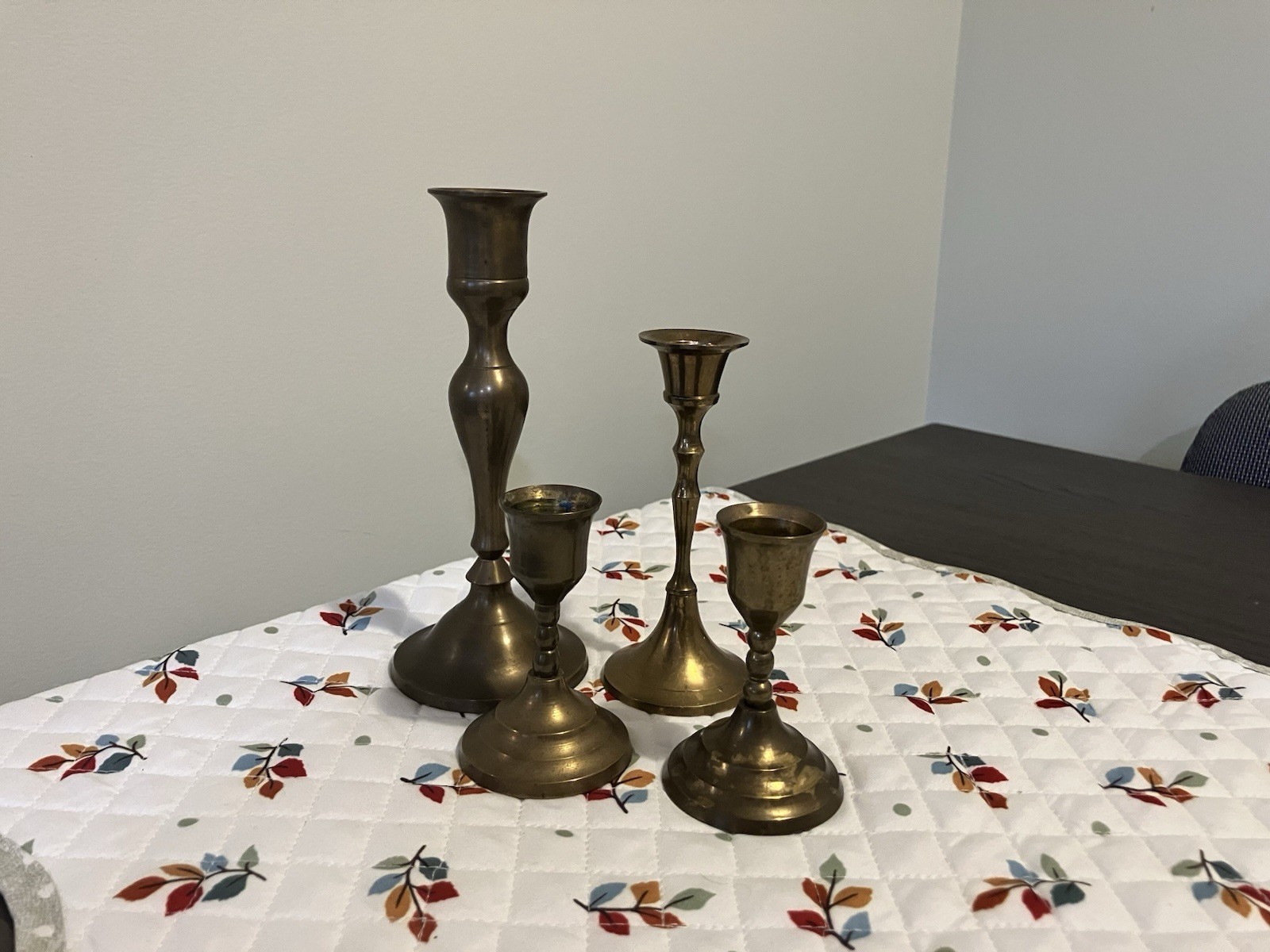Brass Candlestick Holders Lot Of Four. Height 6”to 3”.
