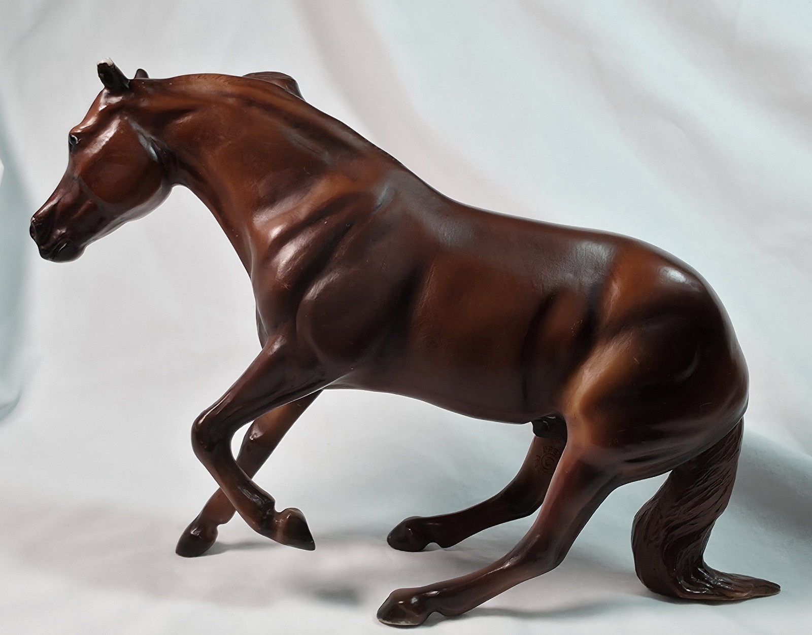 Breyer Horse NRHA 50th Anniversary Model Hollywood Dun It mold. Has Chip On ear