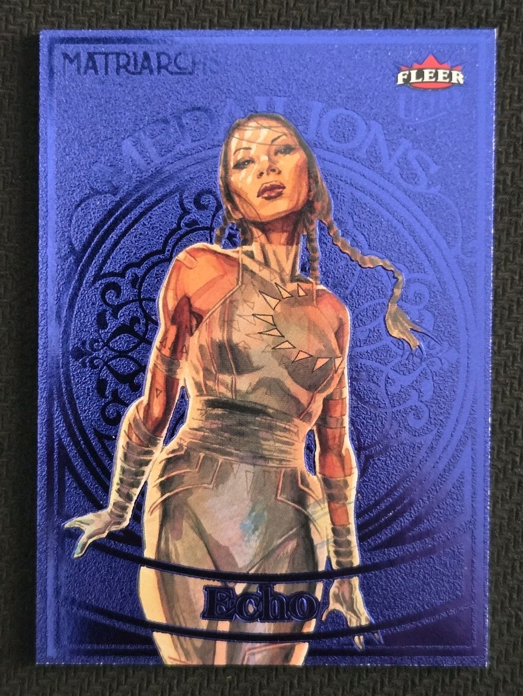 2024 Fleer Ultra, Matriarchs of Marvel - Echo M-38, Amethyst Medallion /35 2024 Fleer Ultra, Matriarchs of Marvel - Echo M-38, Amethyst Medallion /35