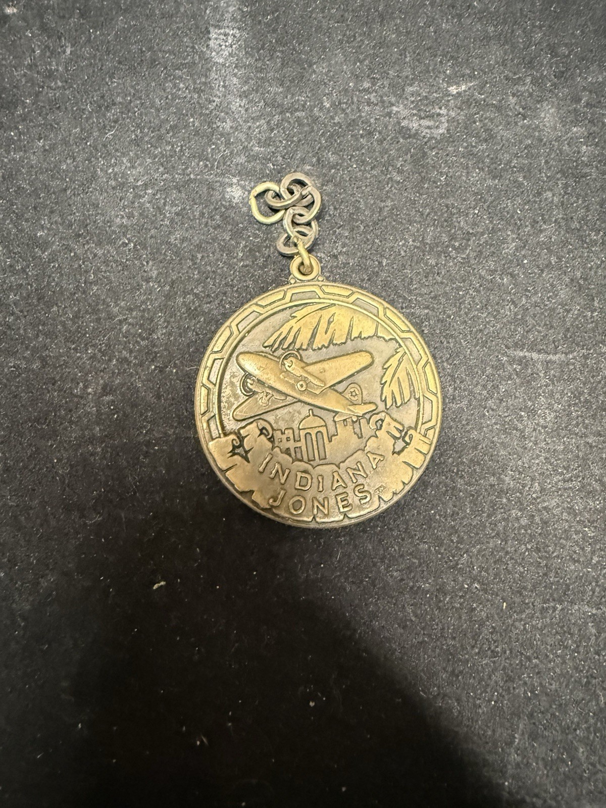 Vintage Universal Studios Indiana Jones Epic Stunt Spectacular Bronze Coin Keych
