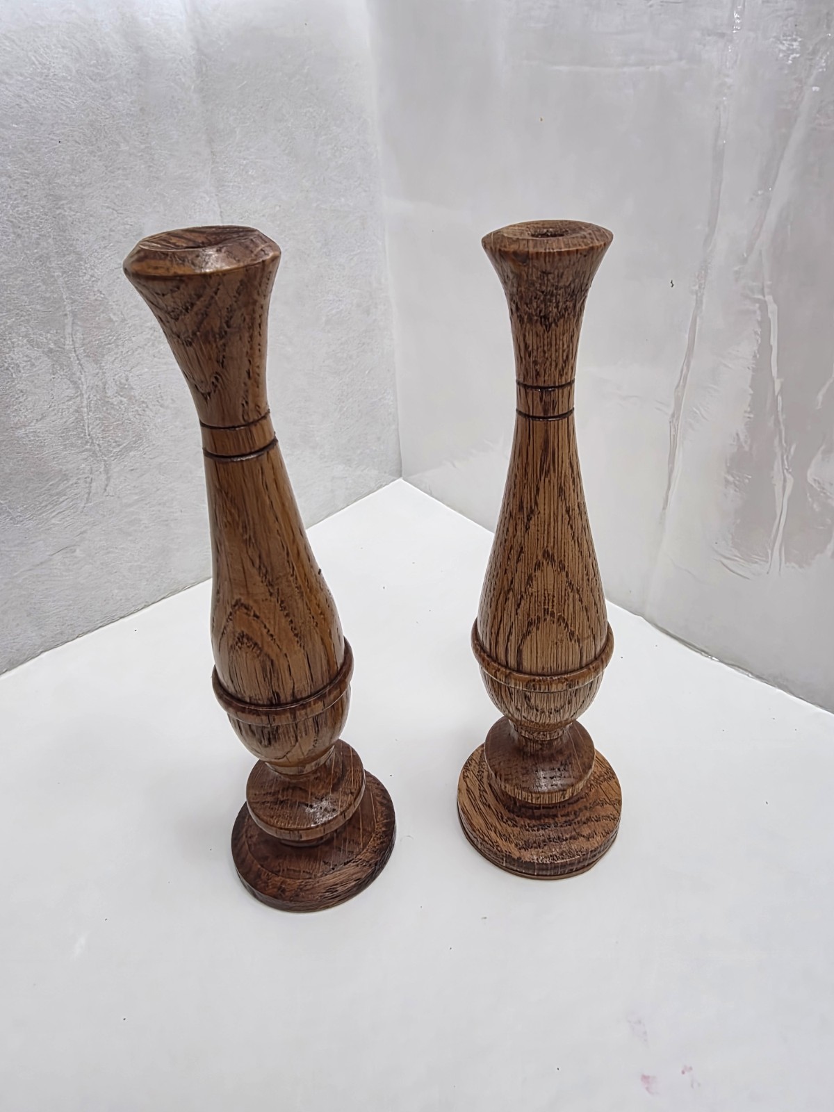 Handturned oak wood bud vase with classic baluster profile set (#4). Handturned oak wood bud vase with classic baluster profile set (#4).