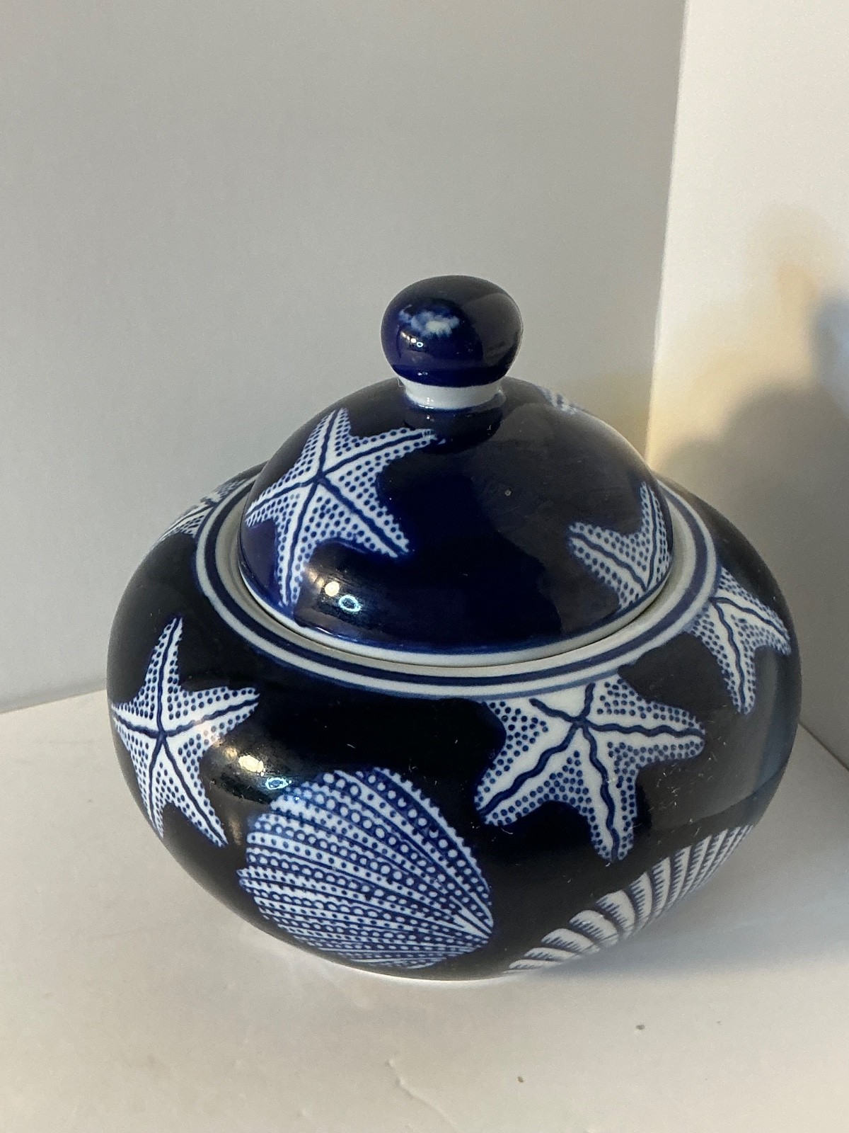 Coastal design lidded blue and white vanity/keepsake jar/bowl