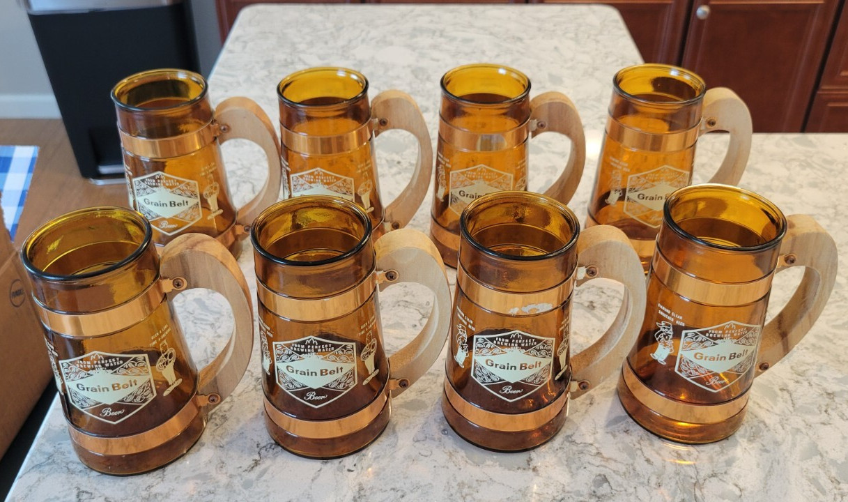 New Vintage Grain Belt Beer Stein Mug Brown Glass Wood Handle Set Lot of 8 New Vintage Grain Belt Beer Stein Mug Brown Glass Wood Handle Set Lot of 8
