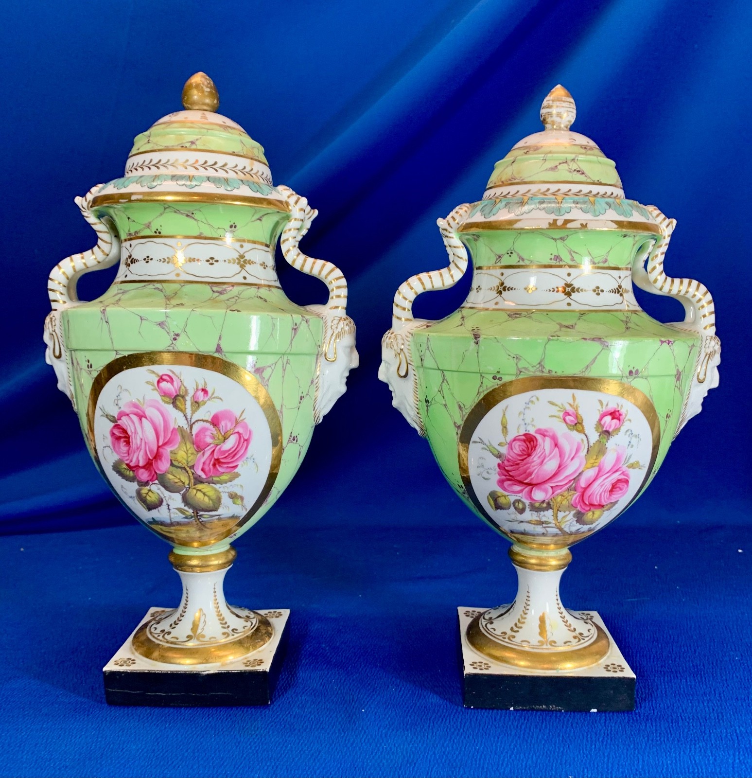 PAIR OF FRENCH / AUSTRIAN PORCELAIN 19TH CENTURY PINK ROSES W/ FACE HANDLES URNS