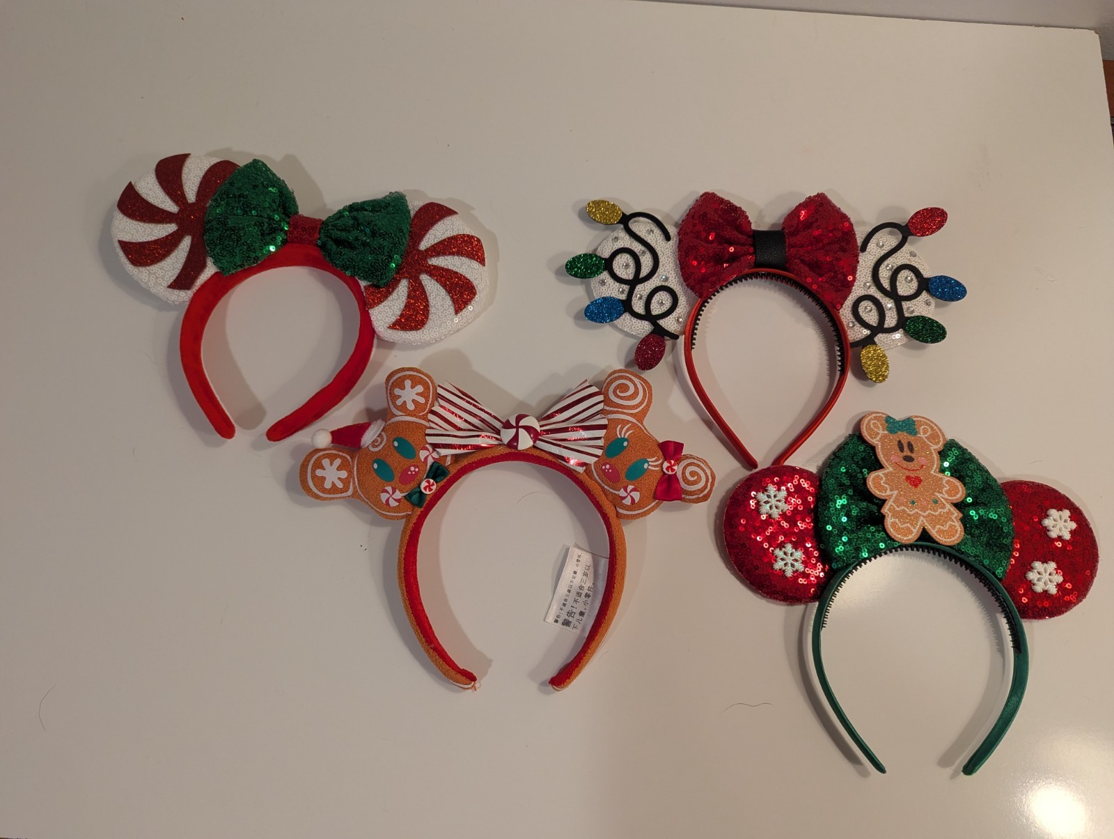 Disney Mickey Holiday Ears with sequins lot of 4 VERY lightly used or never worn Disney Mickey Holiday Ears with sequins lot of 4 VERY lightly used or never worn