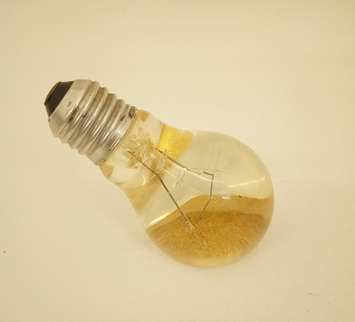 Vintage advertising paperweight light bulb gold fleck Electric City Seattle Vintage advertising paperweight light bulb gold fleck Electric City Seattle
