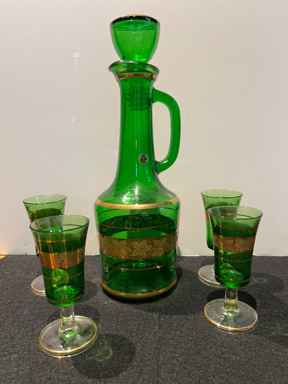 Vintage Made in Italy glass decanter and 4 footed glasses