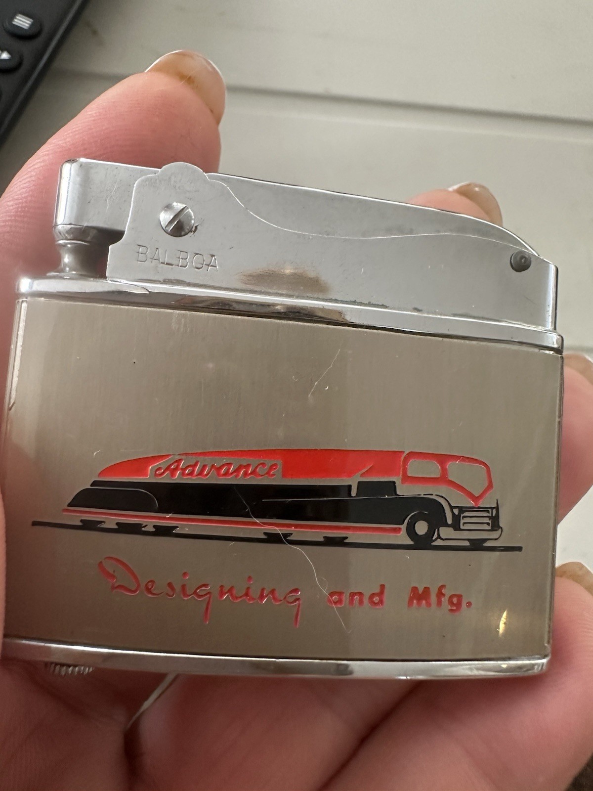 Vintage Wellington Balboa Advance Body & Tank Inc. LA CA.  Advertising Lighter