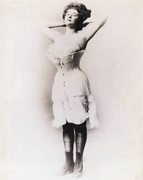 Full length photograph of a young lady modeling a Victorian corset Old Photo Full length photograph of a young lady modeling a Victorian corset Old Photo