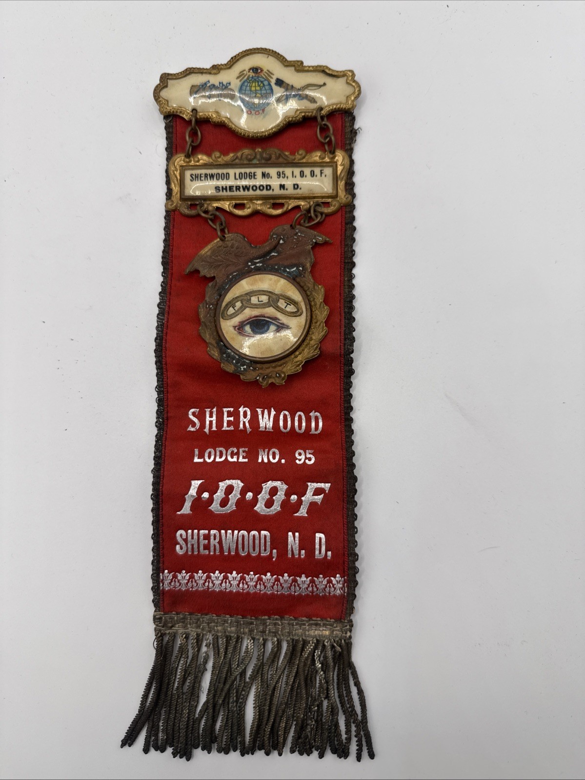 Antique IOOF Odd Fellows Badge Celluloid Ribbon Seeing Eye Shereood, ND Lodge 95 Antique IOOF Odd Fellows Badge Celluloid Ribbon Seeing Eye Shereood, ND Lodge 95