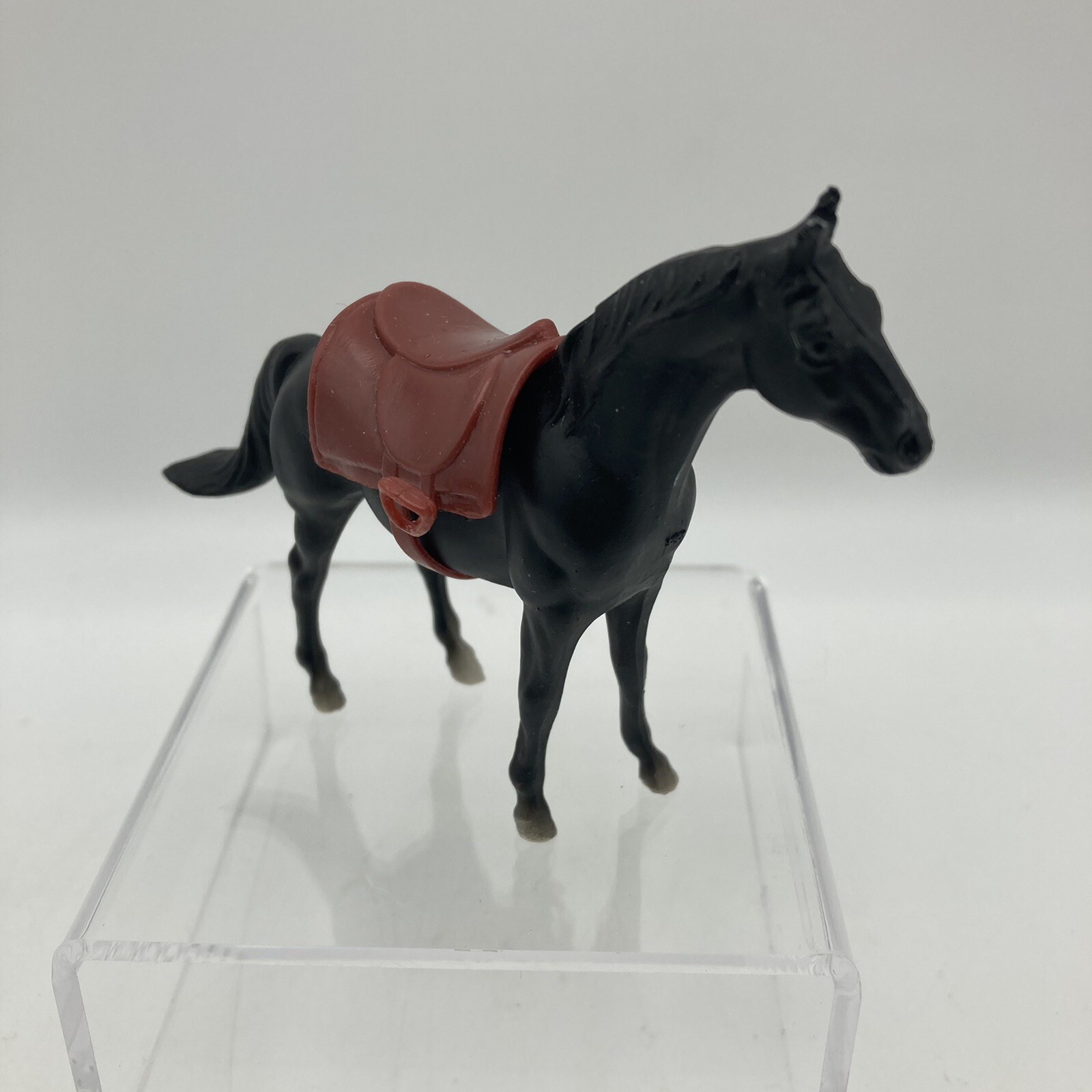 Vintage 1975 Breyer Molding Company Miniature Black Horse w/ Brown Saddle, 3'' Vintage 1975 Breyer Molding Company Miniature Black Horse w/ Brown Saddle, 3''