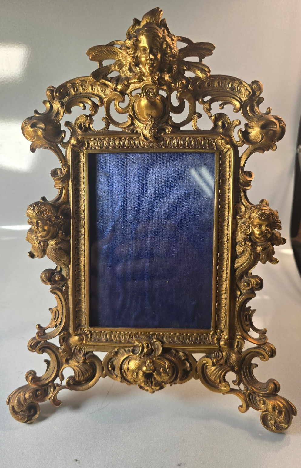 French Rococo Style Gilt Cast Metal Cherub Angel Easel Back Picture Frame French Rococo Style Gilt Cast Metal Cherub Angel Easel Back Picture Frame