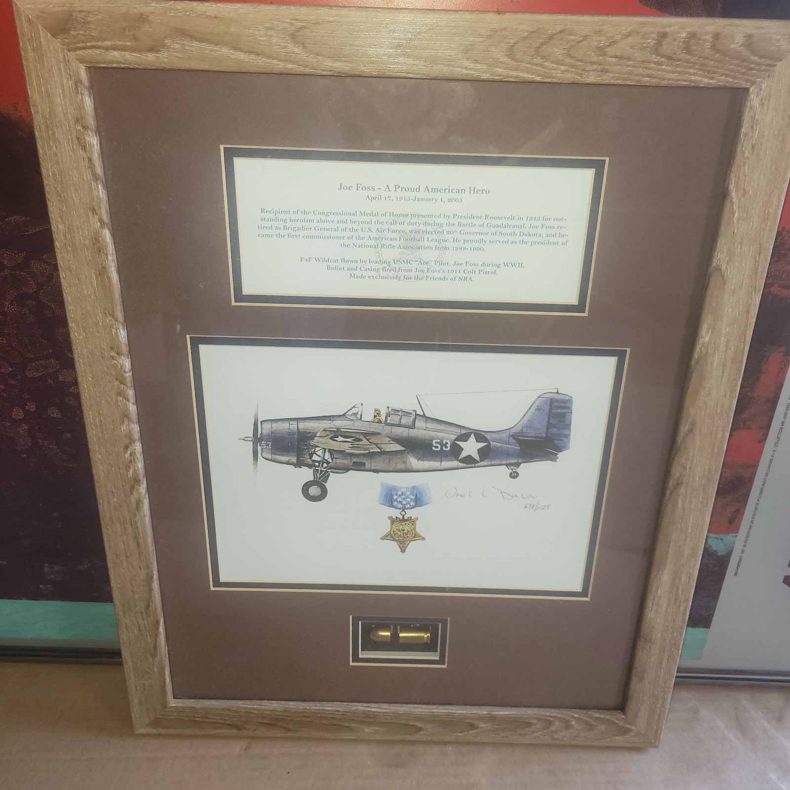 Framed/numbered Joe Foss ART with Spent 45 cal Cartridge/Slug by Noel Dunn Framed/numbered Joe Foss ART with Spent 45 cal Cartridge/Slug by Noel Dunn