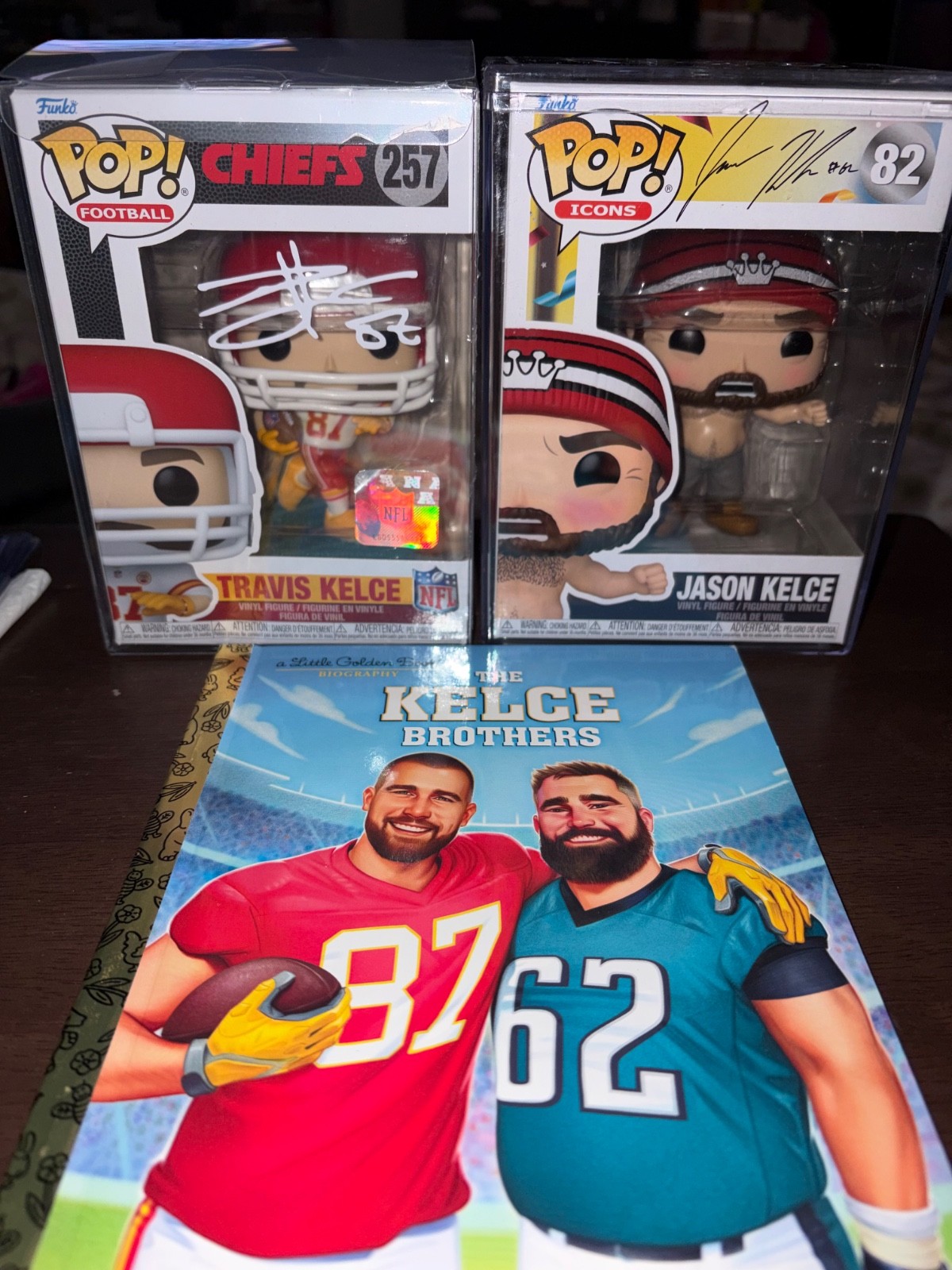 Funko Pop Travis Kelce #257 & Jason Kelce #82 (autographed) Kelce Brothers Book
