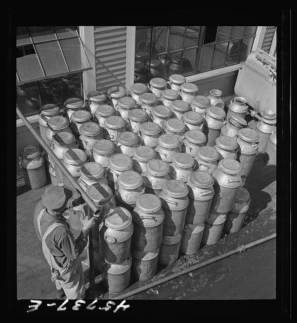 Photo:Milk cans at the United Farmers' cooperative creamery