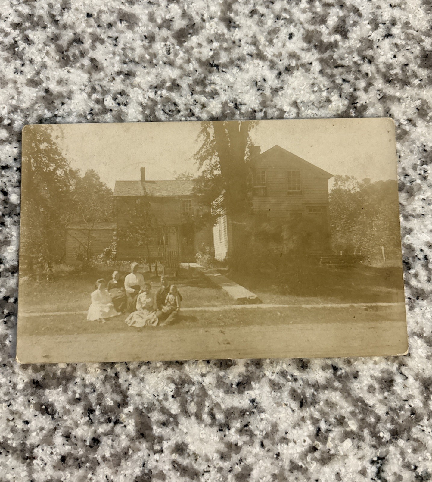 IA Forest City 1908 RPPC real photo postcard Iowa people sitting outside