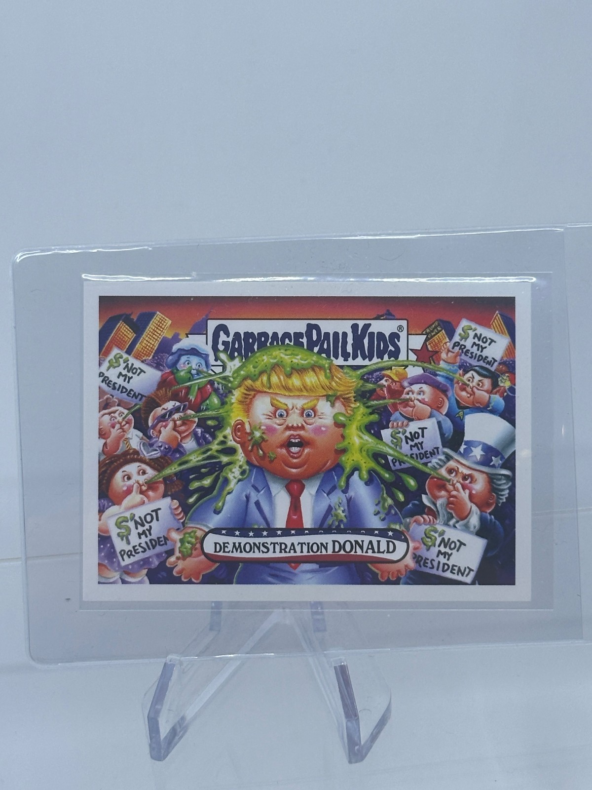 2016 Topps GPK DisgRace To The White House #70 Demonstration Donald Trump PR 622 2016 Topps GPK DisgRace To The White House #70 Demonstration Donald Trump PR 622