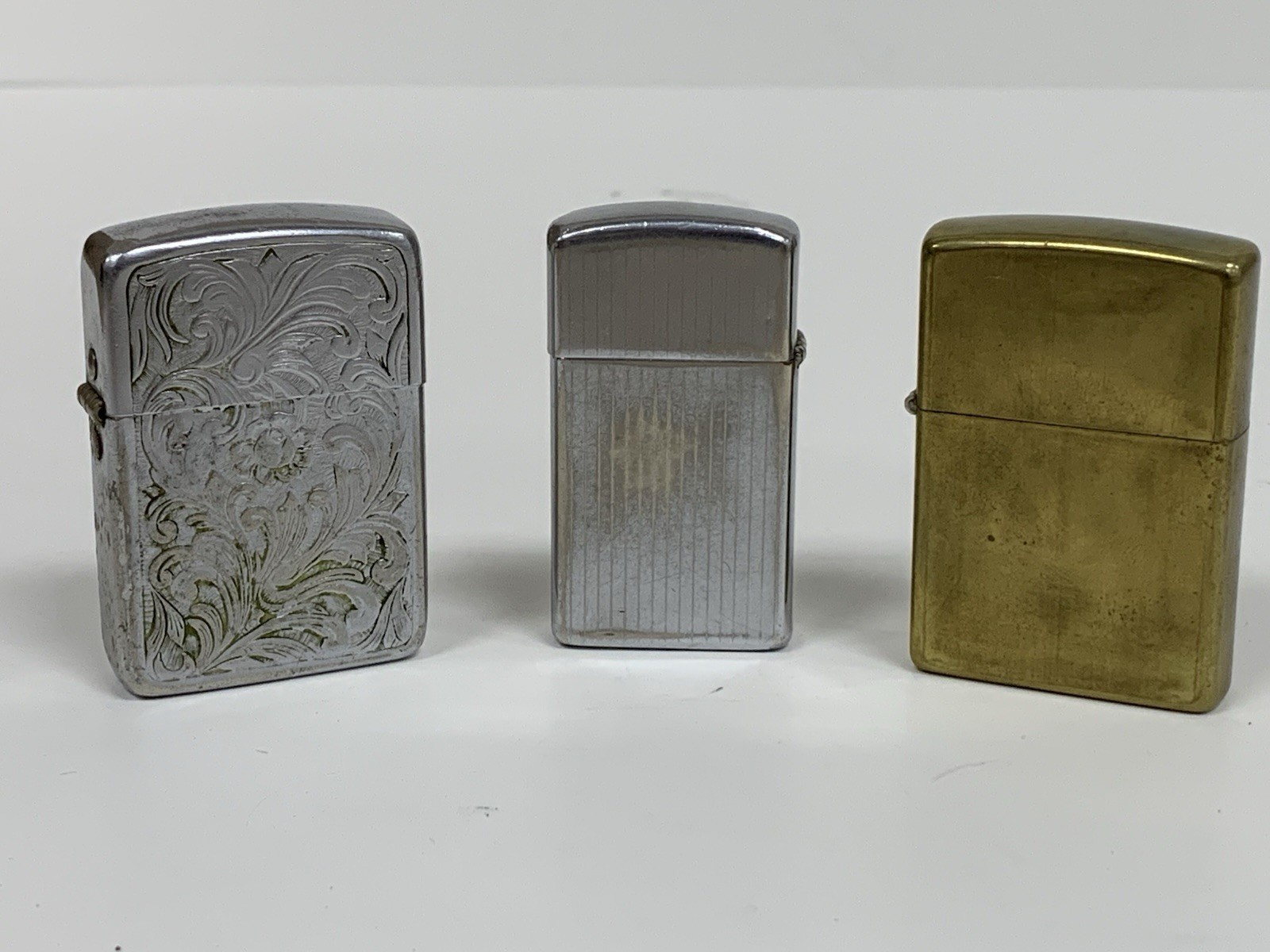 Vintage Lighter Lot of 3 Zippo Unfired Brass Satin Chrome Park Floral Scrollwork Vintage Lighter Lot of 3 Zippo Unfired Brass Satin Chrome Park Floral Scrollwork