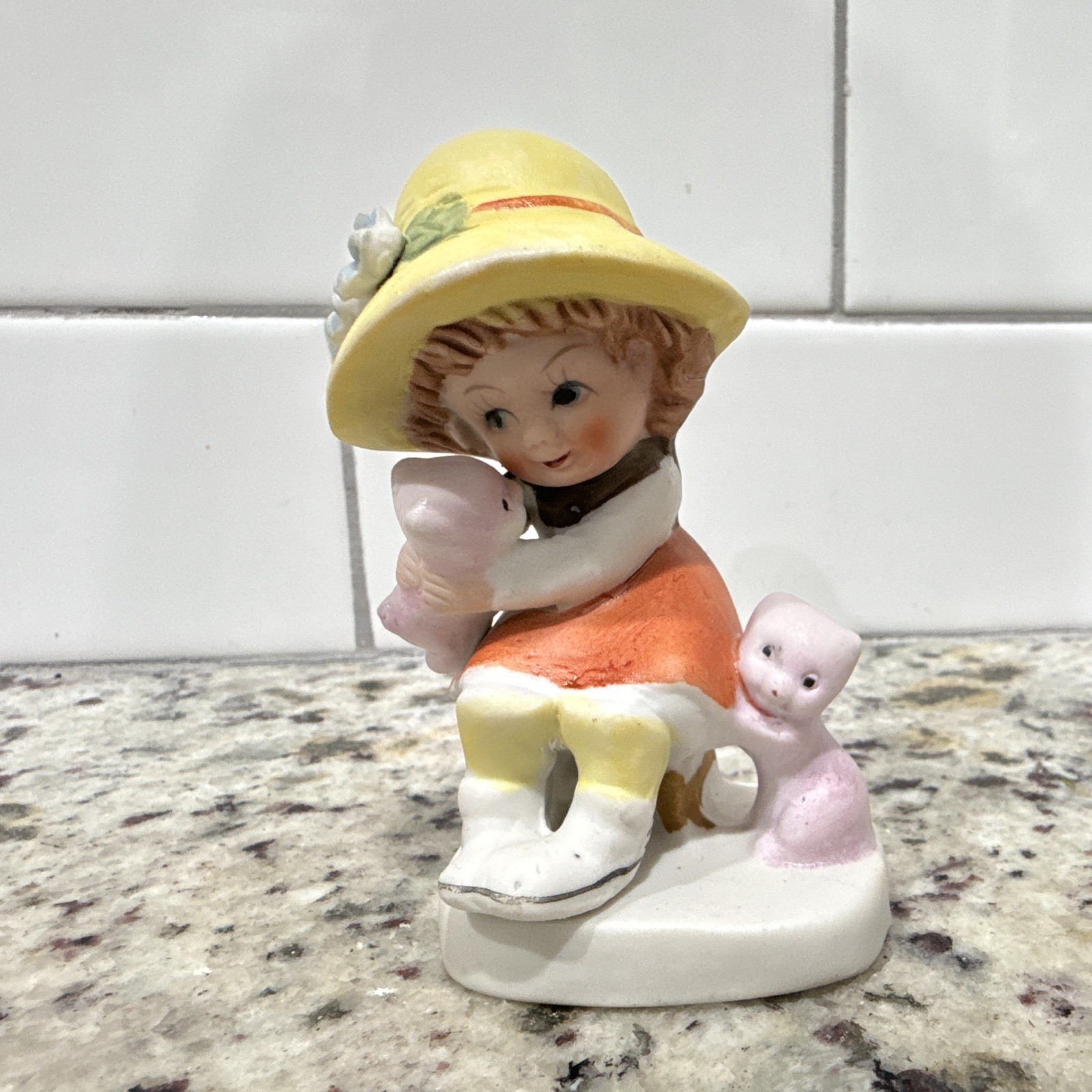 Vintage porcelain figurine of a young girl