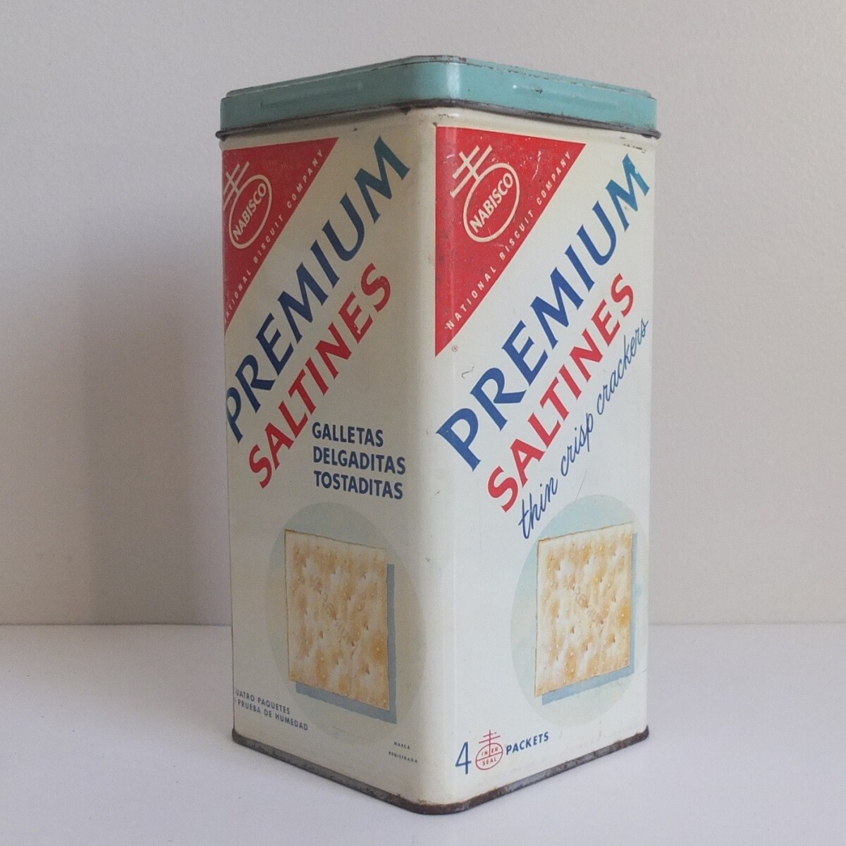 vintage NABISCO Premium Saltines 14 oz tin c.1960—one side is printed in Spanish