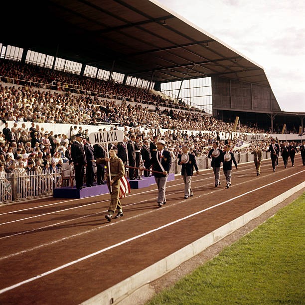 The Malayan team marching past Duke of Edinburgh during opening ce- Old Photo