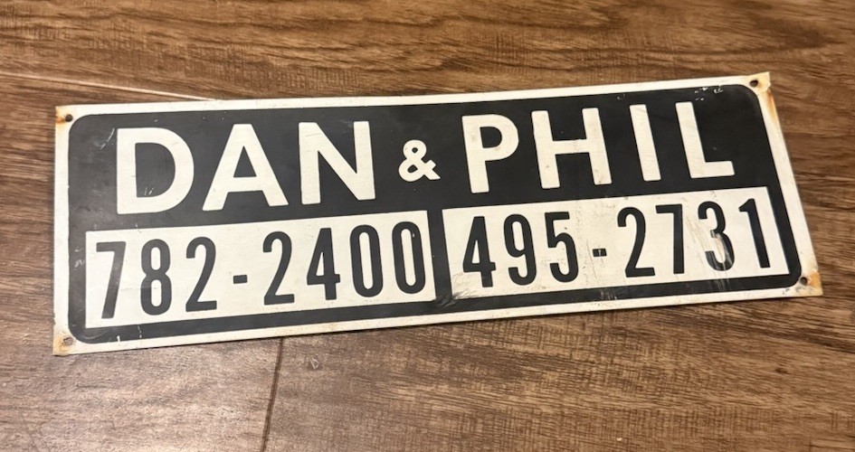 DAN AND PHIL VINTAGE METAL SIGN 12x4