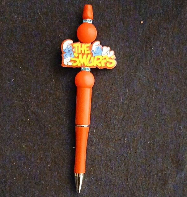 The Smurfs Orange Ballpoint Pen Blue Ink, Plastic w/ Character Design