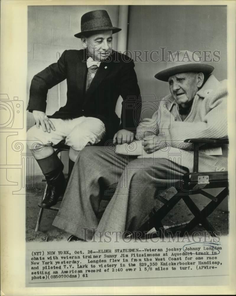 1961 Press Photo Jockey Johnny Longden chats with trainer Sunny Jim Fitzsimmons