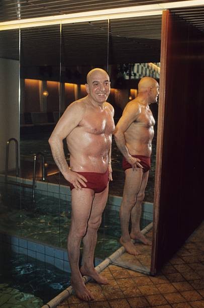 Telly Savalas at the swimming pool Los Angeles California United S- 1983 Photo 2