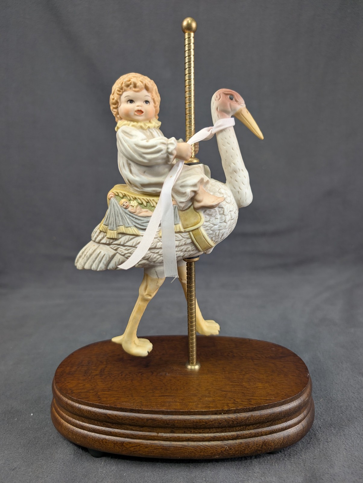 Cosmos Gifts fine porcelain stork musical figurine carousel