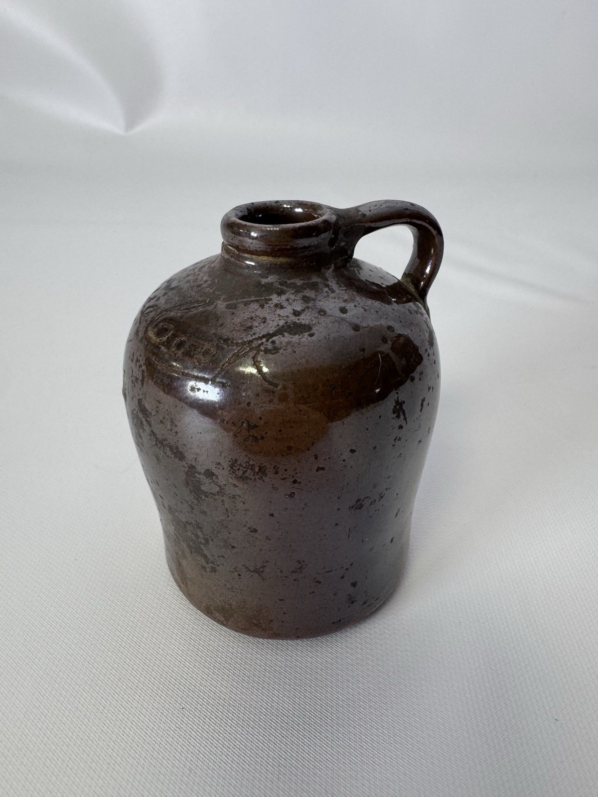 Late 19th Century Small Stoneware Jug, Brown Salt Glaze, Incised Script Design Late 19th Century Small Stoneware Jug, Brown Salt Glaze, Incised Script Design