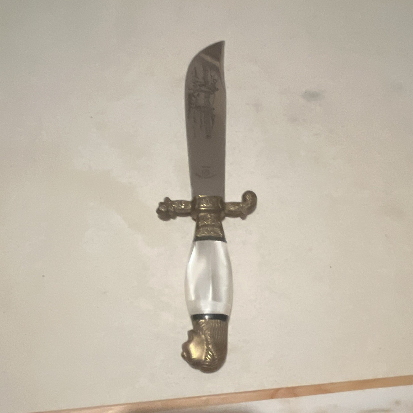 Tramontina Brazil Stainless Steel Dagger, White Plastic Handle, Gold Guard Tramontina Brazil Stainless Steel Dagger, White Plastic Handle, Gold Guard