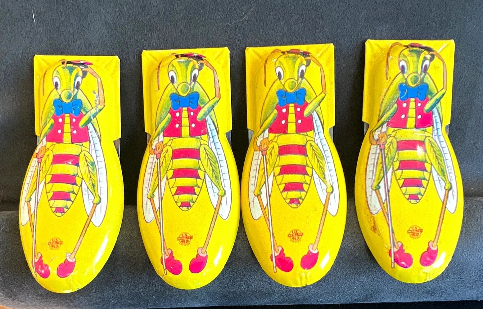 Vintage Original US Metal Toy MFG CO “DAPPER CRICKET” TIN CLICKER. 4 total Vintage Original US Metal Toy MFG CO “DAPPER CRICKET” TIN CLICKER. 4 total