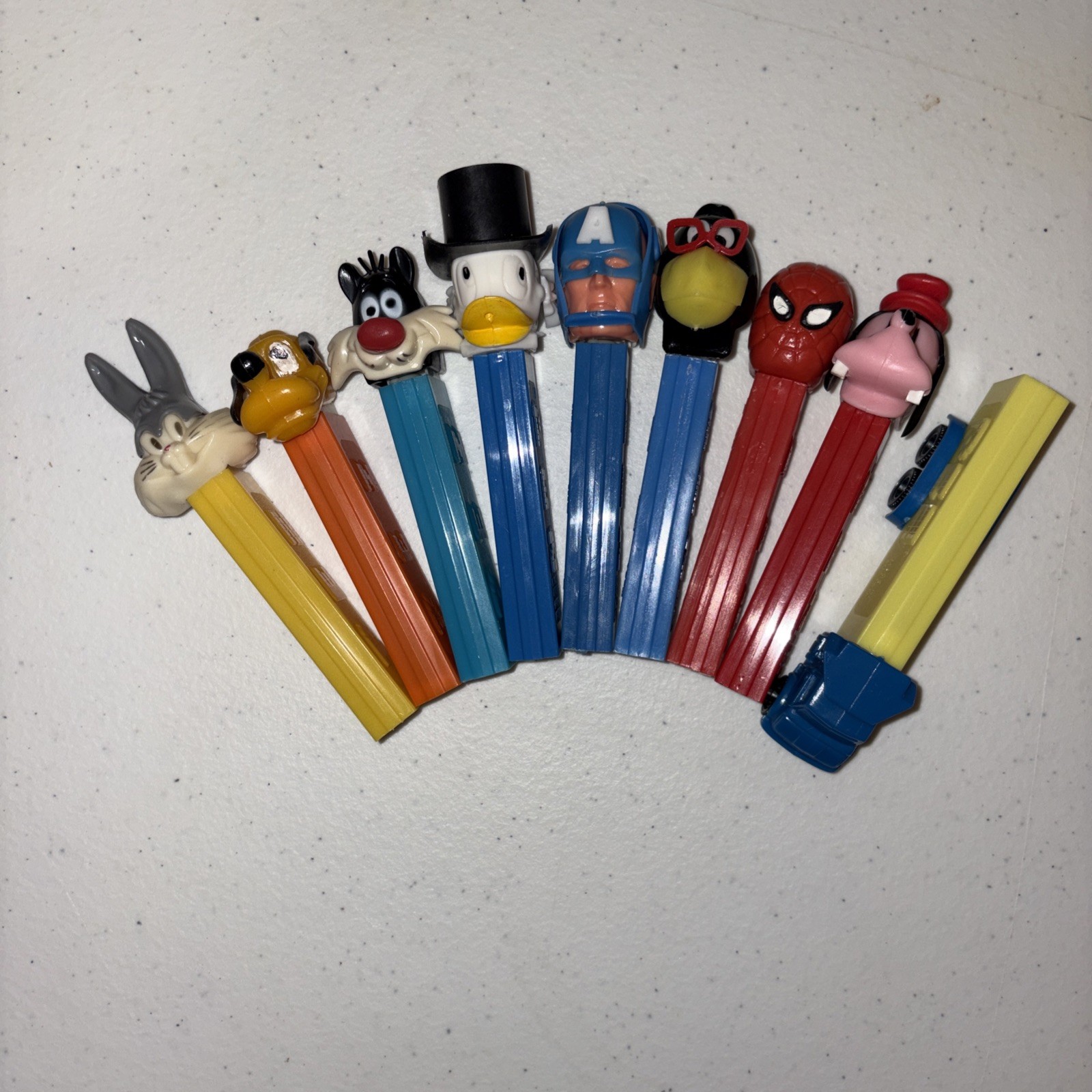 Pez vintage no feet lot of 9 including Truck, Captain America, Raven, Spider Man Pez vintage no feet lot of 9 including Truck, Captain America, Raven, Spider Man