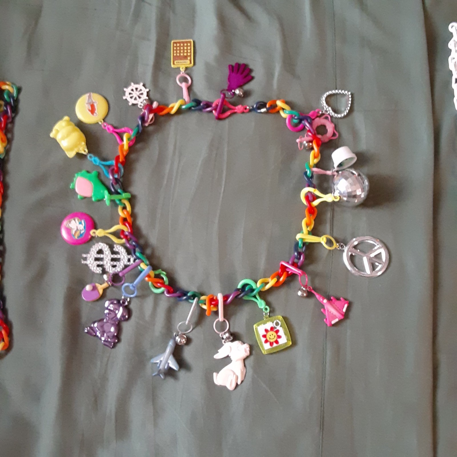 BELL CHARM NECKLACE w/ 19 CHARMS all different also extra chains NEVER USED BELL CHARM NECKLACE w/ 19 CHARMS all different also extra chains NEVER USED