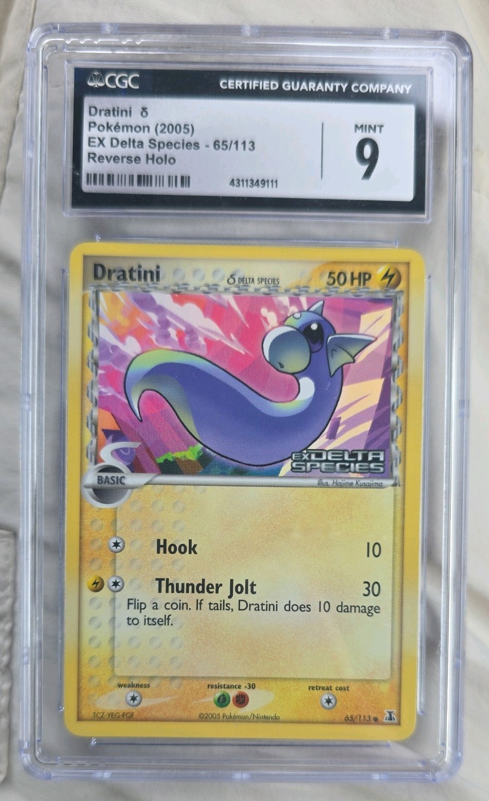 Pokemon Dratini Delta Species STAMPED Reverse Holo 65/113 CGC 9 Tracked Delivery Pokemon Dratini Delta Species STAMPED Reverse Holo 65/113 CGC 9 Tracked Delivery