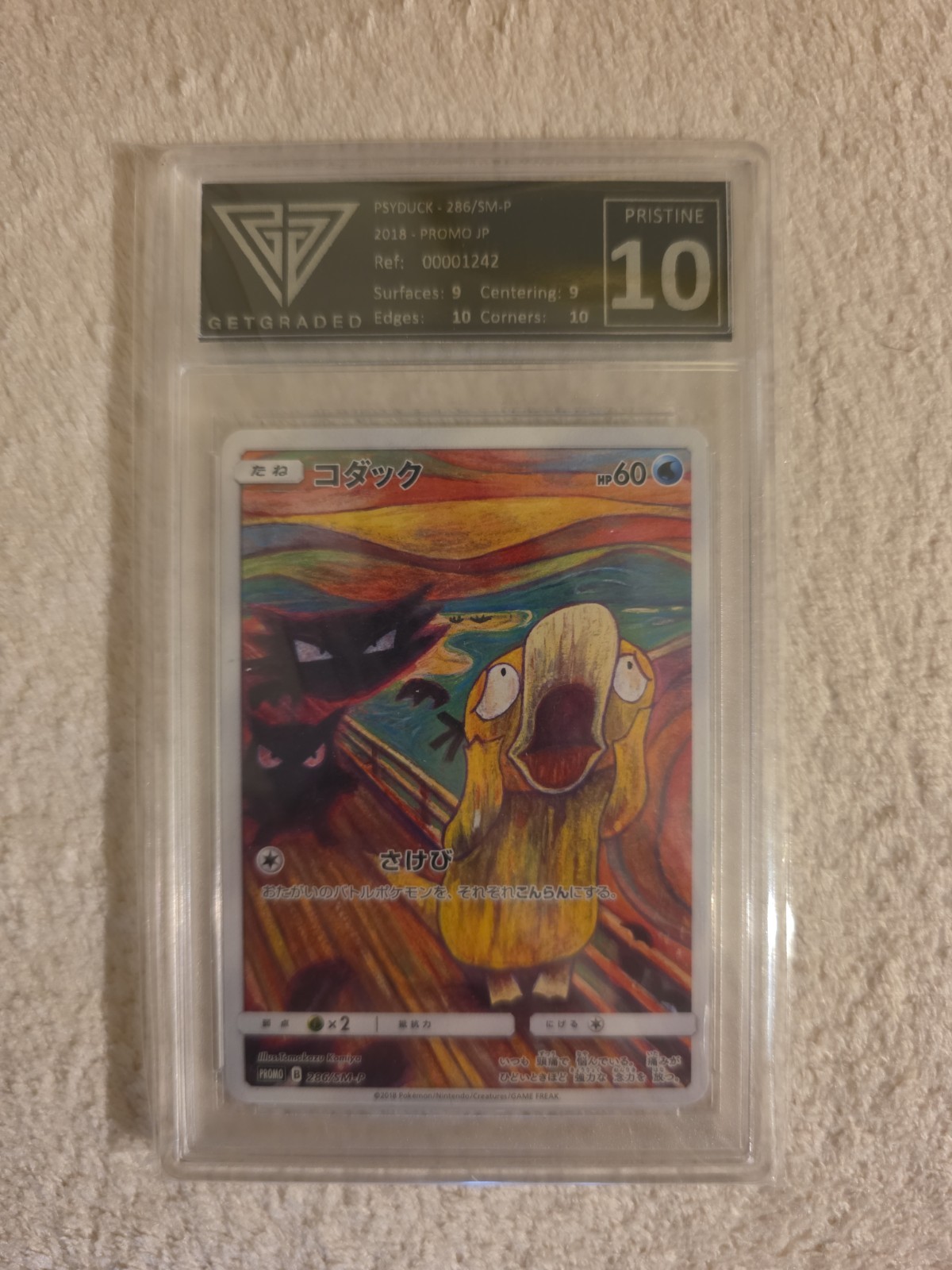 Pokémon Psyduck Munch Promo 286/SM-P Getgraded 10 Pokémon Psyduck Munch Promo 286/SM-P Getgraded 10