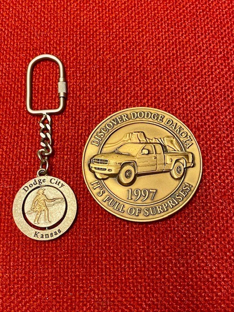 Discover Dodge Dakota Dealer promo & Dodge City Kansas Key Chain 