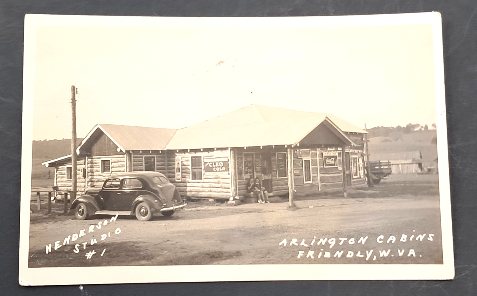 c1940 RPPC Arlington Log Cabins Office w/ Car & Coca Cola Sign Friendly W.V.