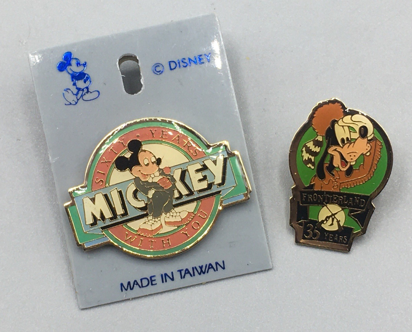 Walt Disney\'s Mickey Mouse 60 Years With You & Goofy Frontierland 35 Years Pins
