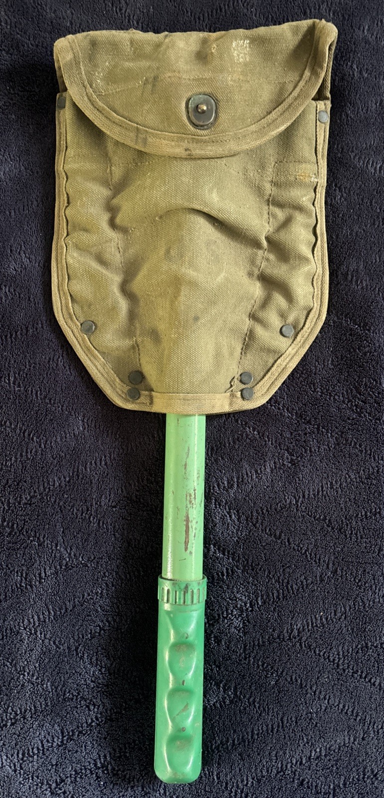 U.S. Army Folding Trench Shovel with Champion Canvas Belt Carrier dated 1957 U.S. Army Folding Trench Shovel with Champion Canvas Belt Carrier dated 1957